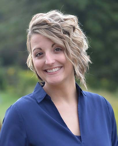 Wall Residences VP of Operations Amanda standing outside