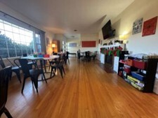 Entire view of the Floyd Star Center room with seating and activity areas