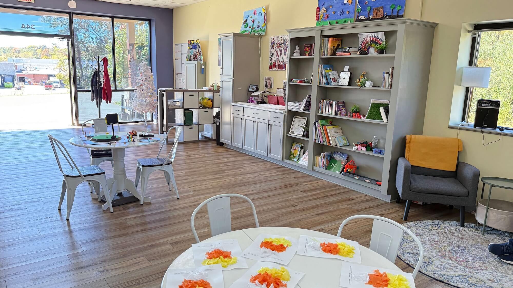 Lobby area with shelves and activities in the Galax Star Center