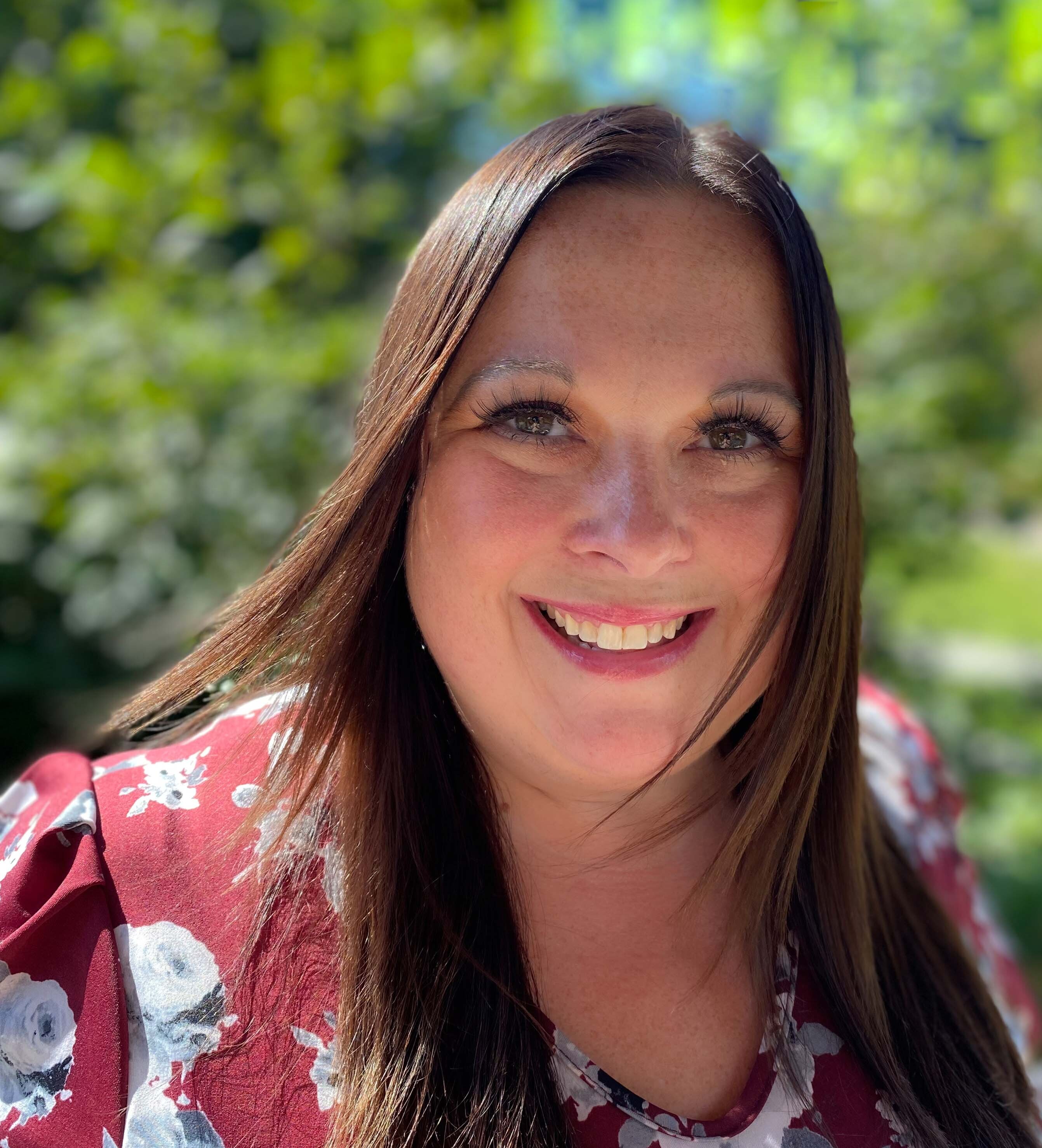 Wall VP of Wall  Community Options Sara Wellons standing outside